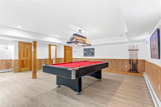 recreation room featuring a baseboard heating unit, light hardwood / wood-style flooring, and billiards