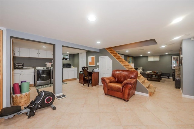 living room featuring washer and clothes dryer