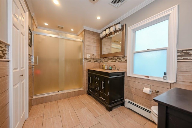 bathroom featuring a baseboard radiator, vanity, toilet, walk in shower, and ornamental molding