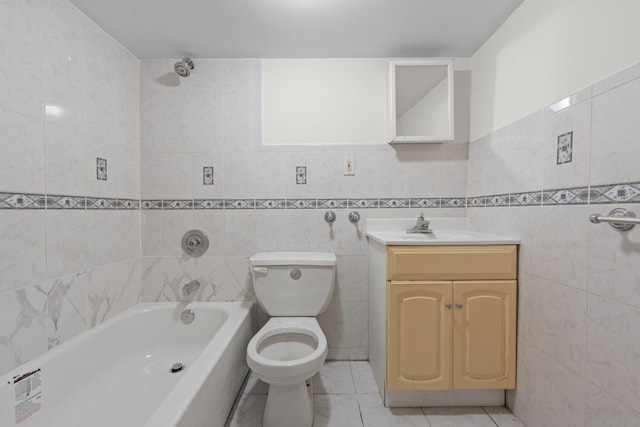 full bathroom with toilet, bathing tub / shower combination, tile walls, tile patterned floors, and vanity