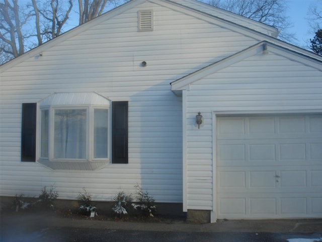 exterior space featuring a garage