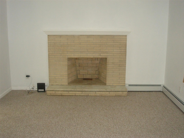 details featuring carpet floors, a baseboard radiator, and a fireplace