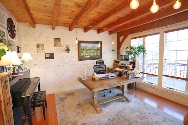 office featuring beamed ceiling, hardwood / wood-style flooring, and wooden ceiling