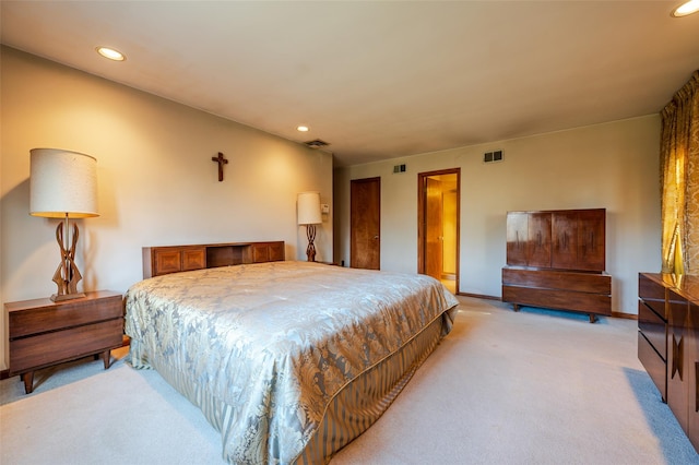 bedroom with light carpet