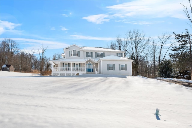 view of property featuring covered porch