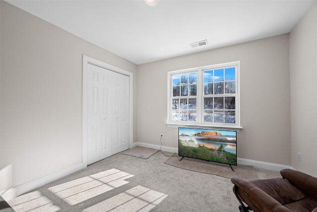 sitting room with light carpet