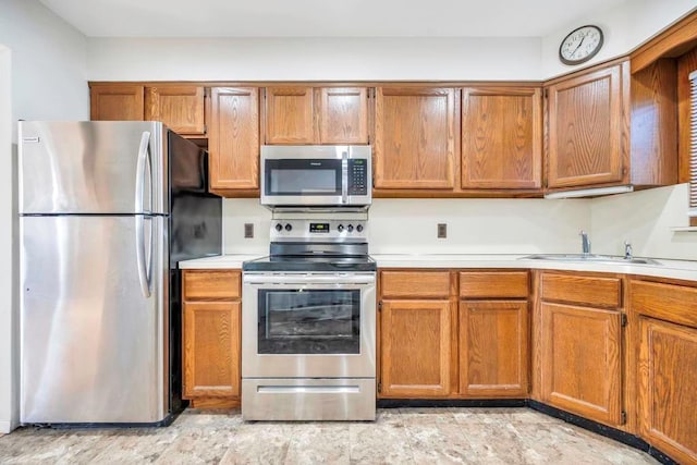 kitchen with sink and stainless steel appliances