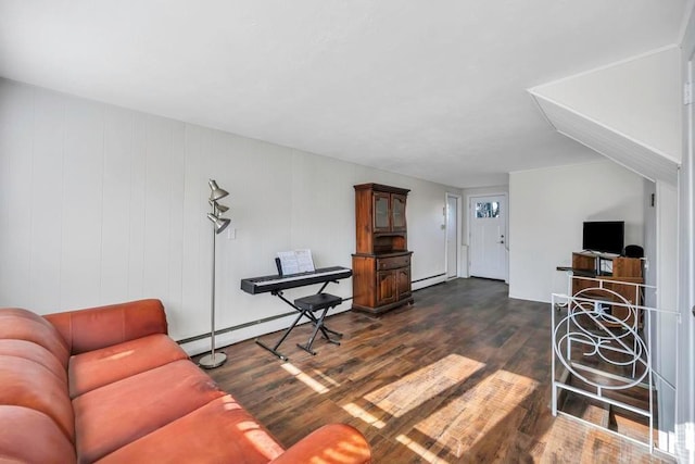 living room with a baseboard radiator and dark wood-type flooring