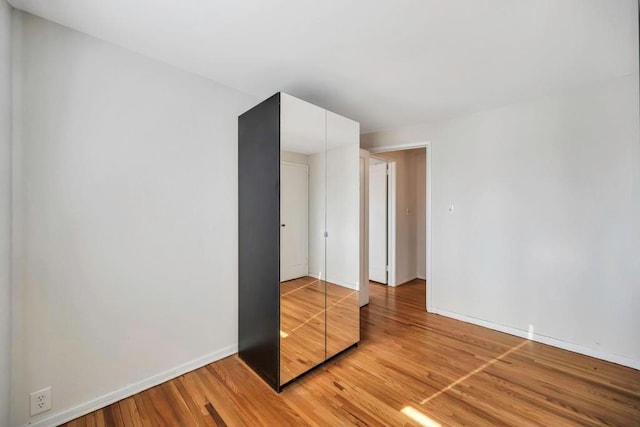 bedroom featuring hardwood / wood-style floors