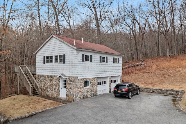 view of front of home with a garage