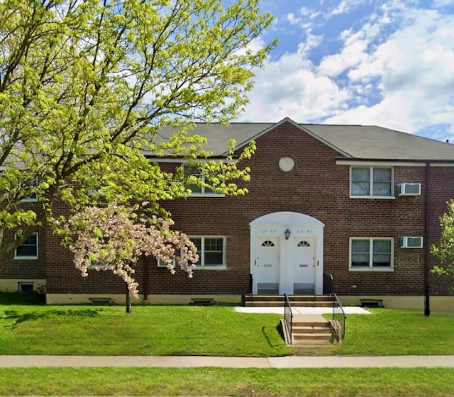 view of front of house with a front yard