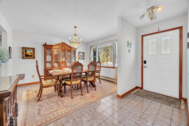 dining area featuring baseboards, baseboard heating, light floors, and a chandelier