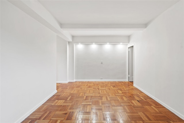 corridor with light parquet floors