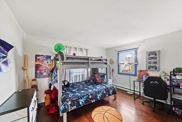 bedroom with hardwood / wood-style floors