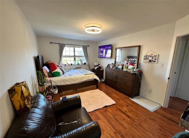 bedroom featuring hardwood / wood-style flooring