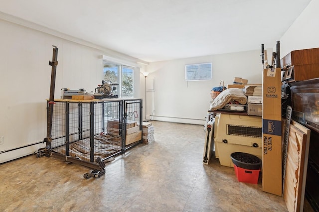 interior space featuring baseboard heating and a wall unit AC