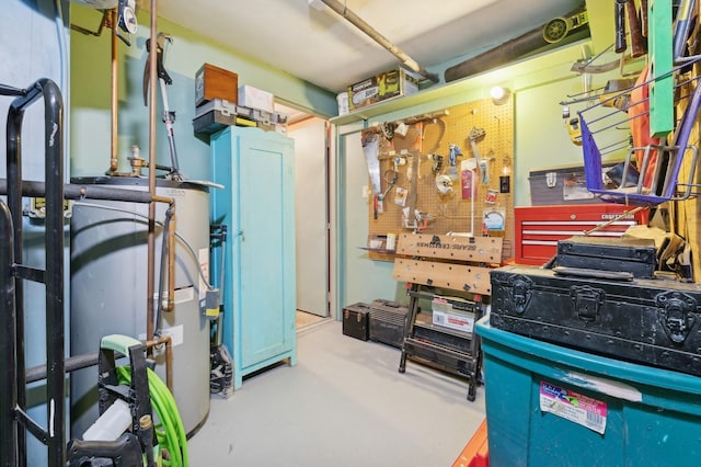 utility room with gas water heater