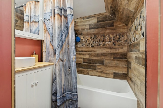 bathroom featuring vanity and shower / bath combo