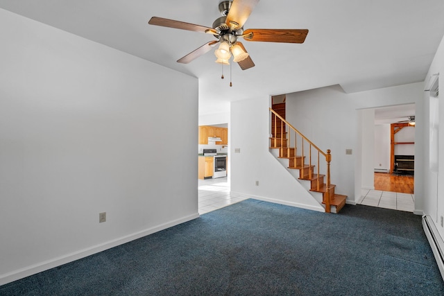 unfurnished living room with ceiling fan, light colored carpet, and a baseboard heating unit