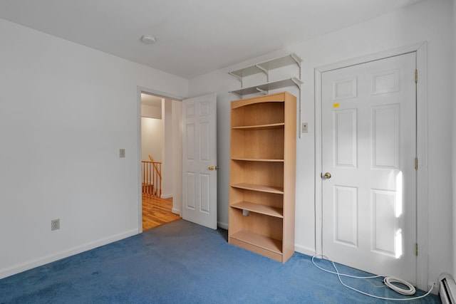 unfurnished bedroom with carpet floors