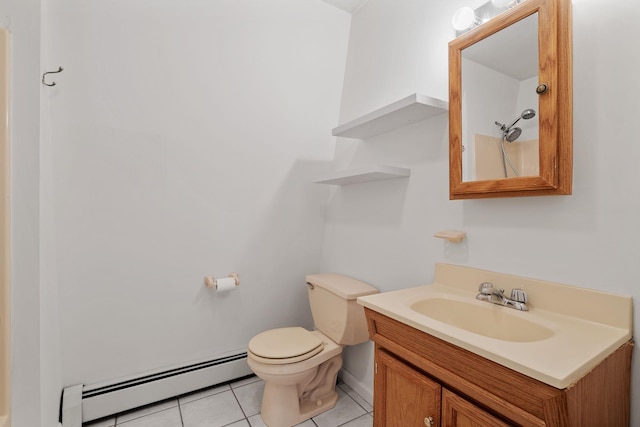 bathroom with tile patterned flooring, vanity, a baseboard heating unit, and toilet