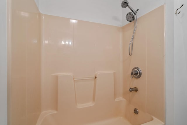 bathroom featuring  shower combination