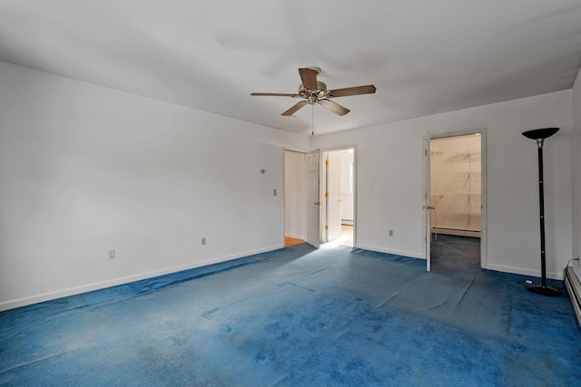 unfurnished bedroom featuring dark colored carpet, ensuite bathroom, ceiling fan, and baseboard heating