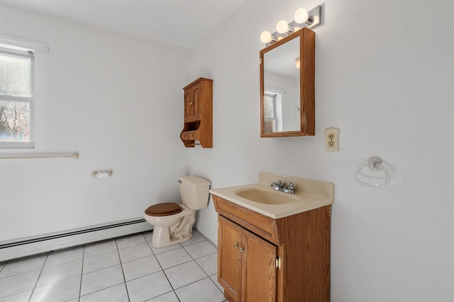 bathroom with a baseboard radiator, vanity, tile patterned floors, and toilet