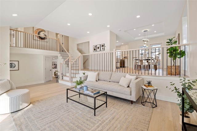 living room with light hardwood / wood-style flooring