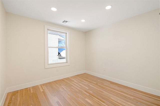 empty room with light wood-type flooring