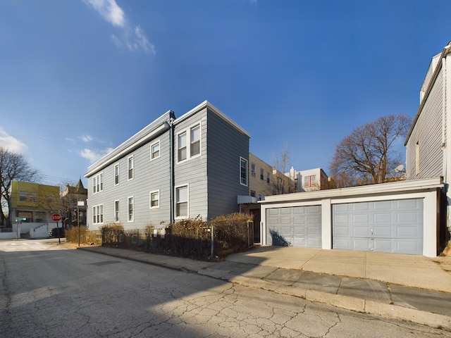 view of property exterior with a garage