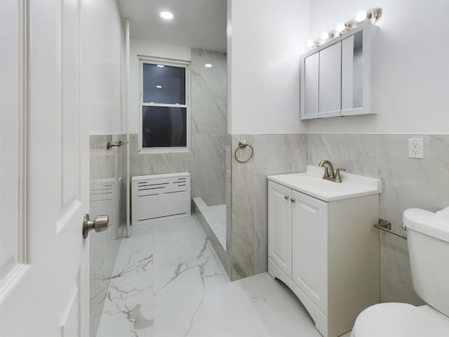 full bath featuring tile walls, marble finish floor, vanity, and toilet