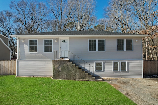 view of front of home with a front lawn