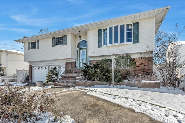 split foyer home featuring a garage