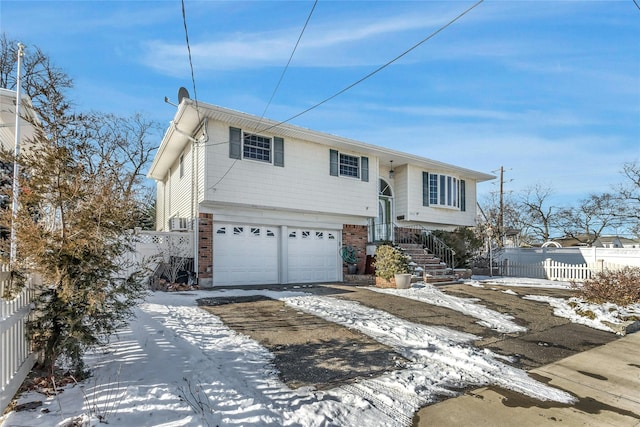 bi-level home featuring a garage