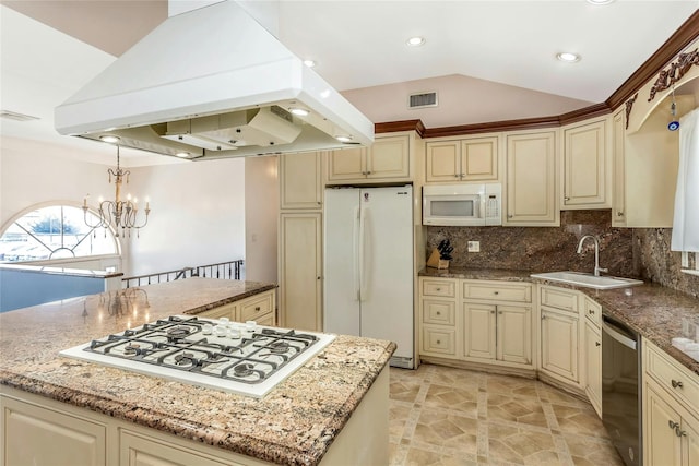 kitchen featuring a kitchen island, island range hood, white appliances, and cream cabinetry