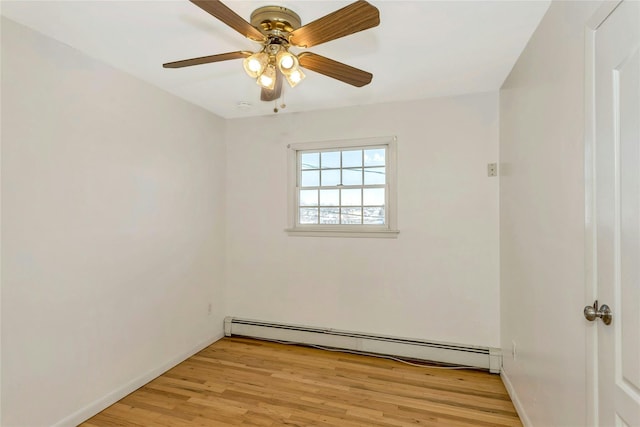 unfurnished room with ceiling fan, a baseboard radiator, and light hardwood / wood-style flooring