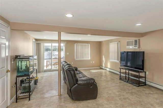 living room with a baseboard heating unit and a wall mounted AC