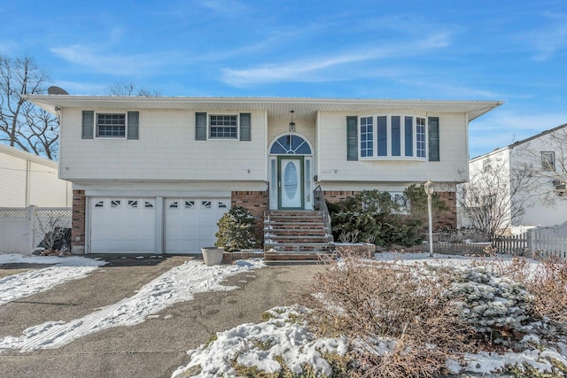 bi-level home featuring a garage