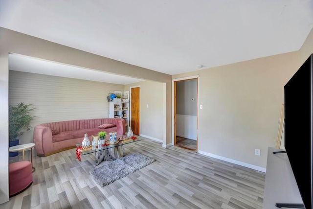 living room with light hardwood / wood-style floors