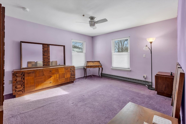 misc room with light carpet, a baseboard heating unit, and ceiling fan