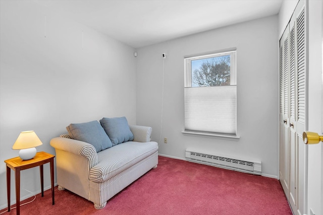 living area with baseboard heating and carpet floors