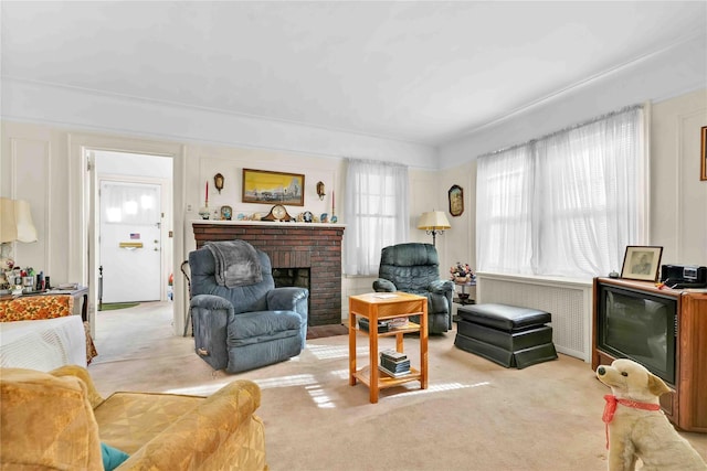 carpeted living room with a fireplace