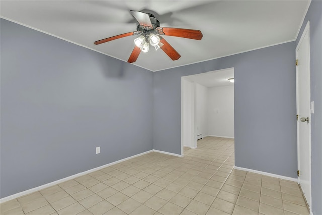 spare room featuring a baseboard radiator, baseboards, crown molding, and ceiling fan