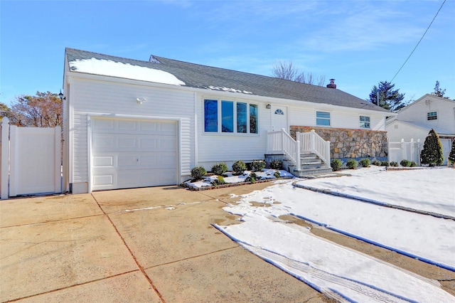 single story home with a garage