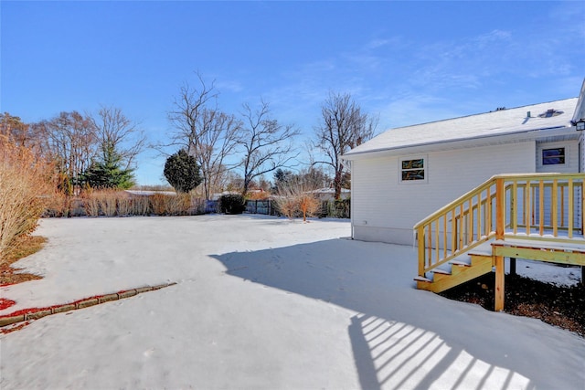 view of yard covered in snow