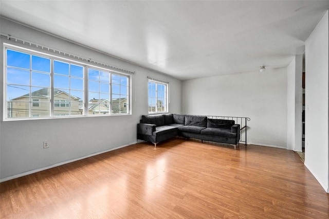 living room with light hardwood / wood-style floors