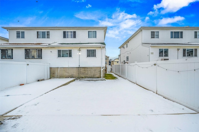 view of snow covered house