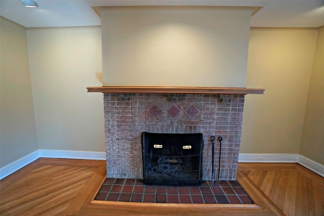 details with a tile fireplace