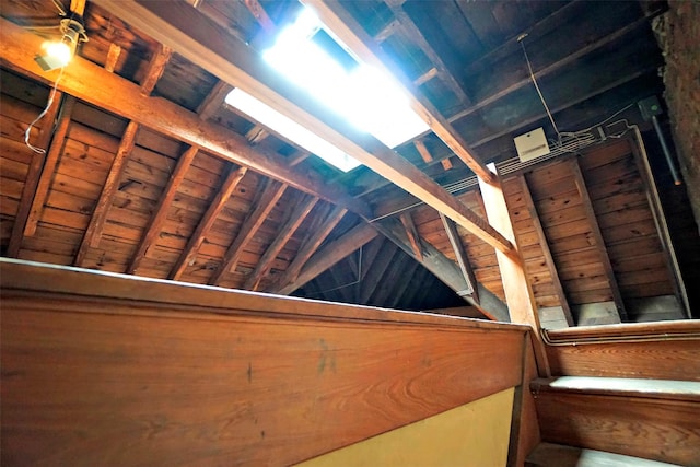 interior space featuring beam ceiling and wooden ceiling